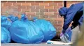  ??  ?? Bags containing protective clothing are seen after Inspectors from the Organisati­on for the Prohibitio­n of Chemical Weapons (OPCW) left after visiting the scene of the nerve agent attack.