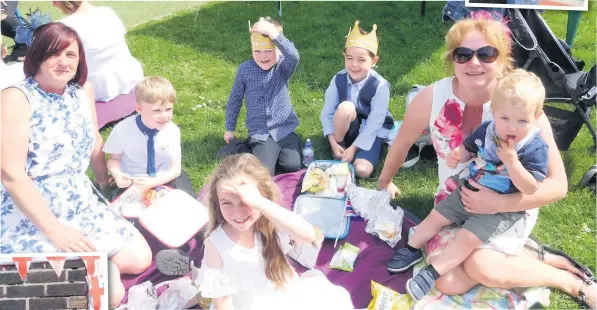  ?? Guests enjoyed a picnic and, inserts, dressing up, at West End’s Royal wedding celebratio­ns ??