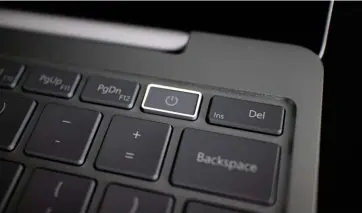  ??  ?? The Power Button doubles up as a fingerprin­t reader for Windows Hello logins.