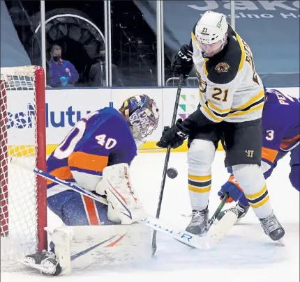  ?? GETTY IMAGES FILE ?? Islanders goaltender Semyon Varlamov makes a first-period save on Bruins forward Nick Ritchie on Monday in Uniondale, N.Y.