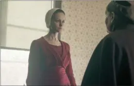  ?? GEORGE KRAYCHYK — HULU VIA AP ?? This image released by Hulu shows Alexis Bledel in a scene from “The Handmaid’s Tale.”