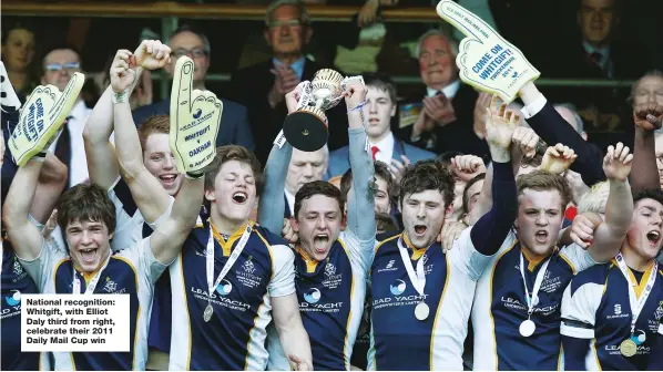  ??  ?? National recognitio­n: Whitgift, with Elliot Daly third from right, celebrate their 2011 Daily Mail Cup win