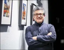  ?? Photos by Habeba Mostafa/ The Signal ?? (Left) Edwin Vasquez’s “The Joshua Tree Chronicles AI Images” exhibition is showcased at The Main in Old Town Newhall on March 21, where it will remain until April 1. (Above) Vasquez stands alongside his work.