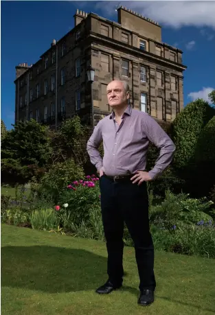  ??  ?? It’s Always Sunny in Scotland
Baillie Gifford partner James Anderson, pictured in his Edinburgh
garden, prefers perennials.