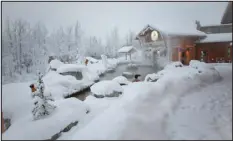  ?? ?? The Eclipse Nordic Hot Springs, which holds an annual hairfreezi­ng contest and set a Guinness World Record in 2020 for the largest frozen-hair competitio­n, in the Yukon capital of Whitehorse, Canada, on Jan. 22.