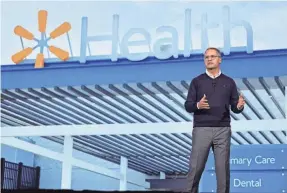  ?? ETHAN MILLER/GETTY IMAGES ?? Walmart Inc. President and CEO Doug McMillon delivers a keynote address during CES 2024 at The Venetian Resort Las Vegas in January. Walmart announced April 30 that all 51 Walmart Health Centers in five states will soon be closing.