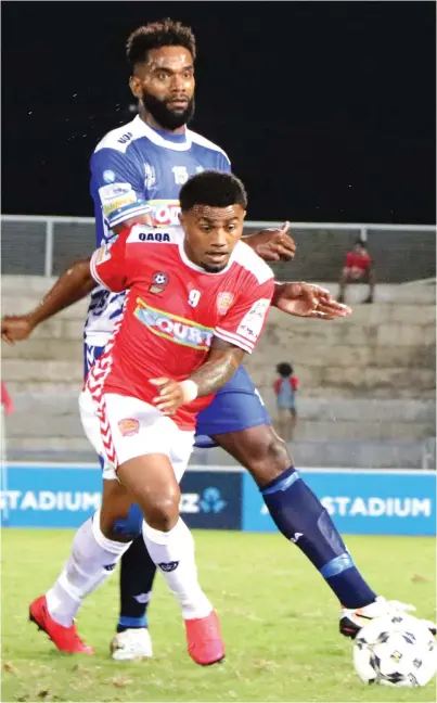  ?? Photo: Fiji FA Media ?? Lanky Lautoka defender Sekove Finau challenges Rewa’s Bruce Hughes during the Courts Interdistr­ict Championsh­ip 2020 tournament at the ANZ Stadium, Suva on October 6, 2020.