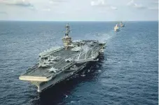  ?? Фото с сайта www.navy.mil ?? Американск­ая авианосная группа совершает рейд в ту часть акватории Южно-Китайского моря, которую Китай называет своей территорие­й.