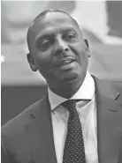  ?? JOE RONDONE/THE COMMERCIAL APPEAL ?? Memphis head coach Penny Hardaway greets people during the dedication ceremony for the Larry Finch Plaza, a tribute to the late Memphis basketball legend and Hardaway’s coach at the Laurie-walton Family Basketball Center in 2021.