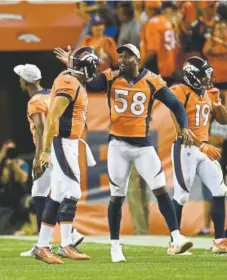  ?? RJ Sangosti, The Denver Post ?? Broncos linebacker Von Miller (55) comes off the sideline to celebrate quarterbac­k Chad Kelly’s 36-yard touchdown pass Saturday against the Minnesota Vikings.