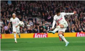  ?? Photograph: Andy Rain/EPA ?? Son Heung-Min scores Tottenham’s third goal from Pierre-Emile Højbjerg’s cross against Eintracht Frankfurt.