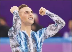  ??  ?? Adam Rippon of the United States reacts after his performanc­e in the men’s single skating free skating in the Gangneung Ice Arena at the 2018 Winter Olympics in Gangneung, South Korea, on Monday.