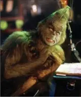  ?? RON BATZDORFF, UNIVERSAL STUDIOS ?? Jim Carrey, as the Grinch in the movie adaptation of “The Grinch Who Stole Christmas.”