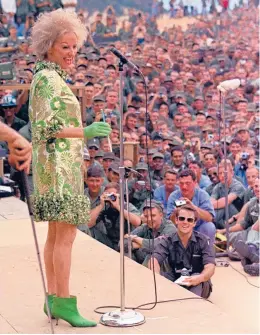  ?? AP ?? Phyllis Diller, seen performing in 1967, is among the comedians featured in “In On the Joke.”