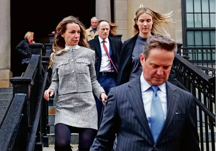  ?? DAVID L. RYAN/GLOBE STAFF ?? Karen Read (left) departed the courthouse Friday with her legal team after the final pretrial hearing at Norfolk Superior Court in Dedham. Jury selection in the case is set to begin on Tuesday.