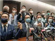  ?? ANTHONY KWAN Getty Images ?? Pro-democracy lawmakers hold a press conference Wednesday in Hong Kong.