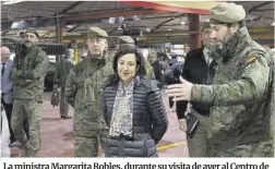  ?? Marta Fernández Jara / Europa Press ?? La ministra Margarita Robles, durante su visita de ayer al Centro de Mantenimie­nto de Sistemas Acorazados de Villaverde, en Madrid.