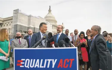  ?? J. Scott Applewhite / Associated Press 2019 ?? Rep. Mark Takano, DRiverside County (left), attends a 2019 rally to support the Equality Act at Capitol.