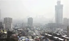  ?? ANI ?? An aerial view of Mumbai amid fog.