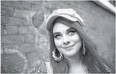  ??  ?? Musician ‘Girli’ poses for a portrait during London Fashion Week in London, Britain on Tuesday. — Reuters photo