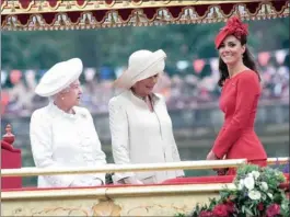  ?? PICTURE: DAVID CRUMP/AP ?? ROYALTY: Britain’s Kate, Duchess of Cambridge, right, Camilla, Duchess of Cornwall, centre, and Queen Elizabeth, follow the proceeding­s on the royal barge, the principal boat of a flotilla of 1 000 vessels, on Sunday.