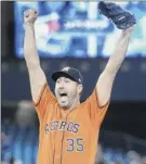  ?? Fred thornhill / the Canadian Press via AP ?? the Astros’ Justin Verlander reacts after beating the Blue Jays 2-0 for the third no-hitter of his career.