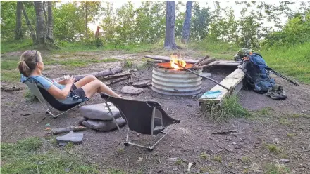  ?? PHOTOS BY CHELSEY LEWIS/MILWAUKEE JOURNAL SENTINEL ?? Backcountr­y campsite LS1 overlooks Lake Superior in the Porcupine Mountains. The site includes a fire ring, bear pole and a wilderness latrine. For more travel stories, see