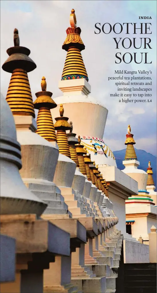  ?? Ann Summa ?? THE ENTRANCE to the sprawling Palpung Sherabling Buddhist monastery in Kangra Valley, India, is lined with large prayer wheels that are set inside stupas.