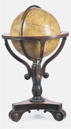  ??  ?? WORLD BEATERS: Terrestria­l and celestial Regency globes which fetched £87,500 at Dreweatts – together with details of Capt Cook’s discoverie­s.