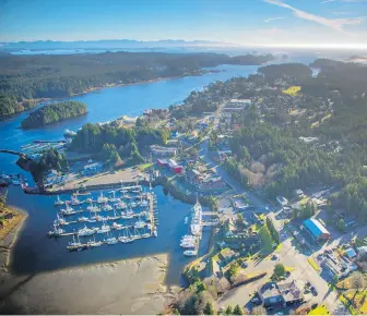  ??  ?? An aerial view of Ucluelet. The B.C. government is expected to give an update this week on its restart, including when people will be able to travel across the province.