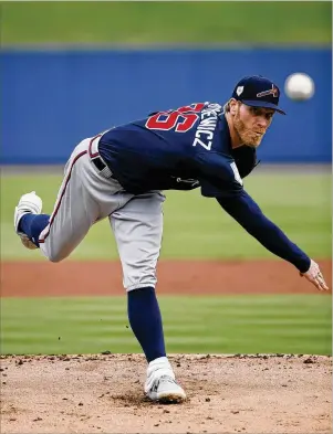  ?? JOE ROBBINS / GETTY IMAGES ?? “To be that opening-day guy that means you’re the ace of that year. It’s a big responsibi­lity, and you take huge pride in trying to go out there and be that No. 1 opening-day starter,” says Mike Foltynewic­z.