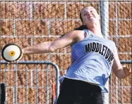  ?? Catherine Avalone / Hearst Connecticu­t Media ?? Middletown senior Veronica Meyer wins the discus with a throw of 121 feet, 11 inches at the Class L track and field championsh­ips on Tuesday at Middletown High School. Meyer won the javelin with a throw of 118 feet, 9 inches.