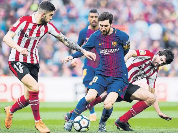  ?? FOTO: GETTY ?? Una pesadilla constante San José y Núñez intentan parar a Messi en uno de sus clásicos avances, durante el partido del pasado domingo en Barcelona