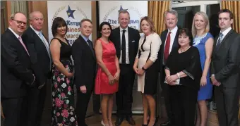  ??  ?? Matt Cooper, TV presenter pictured with members of the Peevers Slye Cotter team (sponsors) at The Kerryman Business Awards in the Ballygarry House Hotel, Tralee.