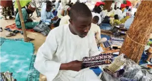  ?? Alhaji Abba with one of his products ??