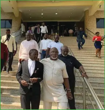  ??  ?? L-R: NFF Counsel, Sani Katu, President Amaju Pinnick and General Secretary, Mohammed Sanusi stepping out of the Federal High Court in Abuja shortly after the judgment ...yesterday