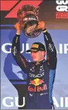  ?? REUTERS ?? Max Verstappen celebrates with the trophy after winning the Bahrain Grand Prix.