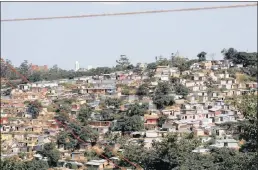  ??  ?? The Bottlebrus­h informal settlement is regarded as prime real estate for the working class and business-minded people who have settled there.