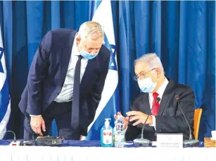  ?? (Marc Israel Sellem/The Jerusalem Post) ?? PRIME MINISTER Benjamin Netanyahu and Alternate Prime Minister Benny Gantz attend the cabinet meeting earlier this week in Jerusalem.