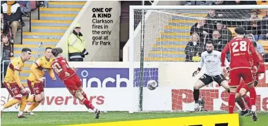  ?? ?? ONE OF A KIND Clarkson fires in the only goal at Fir Park