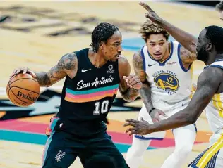  ?? Eric Gay / Associated Press ?? DeMar DeRozan was back in the lineup against the New Orleans Pelicans on Saturday night after missing Wednesday’s game to mourn his father, giving the Spurs 11 active players.