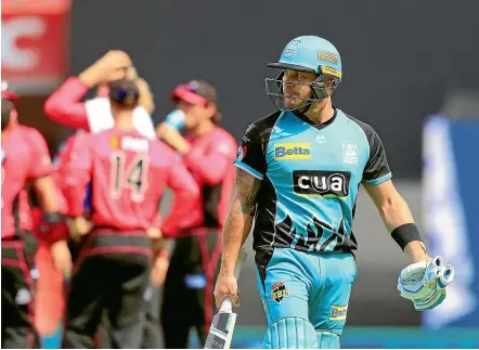  ?? GETTY IMAGES ?? Brendon McCullum departs after being dismissed for eight in the latest Big Bash match against the Sydney Sixers on New Years Day in Gold Coast. His average this season is 5.33.