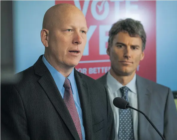  ?? ARLEN REDEKOP/POSTMEDIA NEWS FILES ?? Port Coquitlam Mayor Greg Moore, left, and Vancouver Mayor Gregor Robertson are two leaders on the Mayors’ Council on Regional Transporta­tion who last year failed to convince Metro Vancouver taxpayers to add a new sales tax to fund TransLink despite...