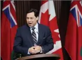  ?? NATHAN DENETTE, THE CANADIAN PRESS ?? Economic Developmen­t Minister Brad Duguid says the trade deal will add jobs and money to economy.
