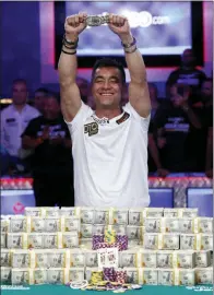  ?? JOHN LOCHER -AP ?? Hossein Ensan, of Germany, poses with the bracelet after winning the World Series of Poker main event, Wednesday, in Las Vegas.