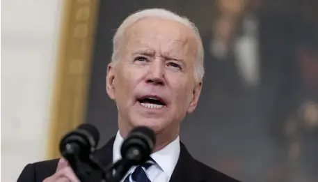  ?? Ap pHotoS ?? THEY DIDN’T GET TO AIRPORT ON TIME: President Joe Biden speaks in the State Dining Room at the White House, Thursday. Biden has defended his actions in ending the U.S. in Afghanista­n and sticking to the timetable of a hasty retreat out of the country by Americans and Afghans who wanted to leave.