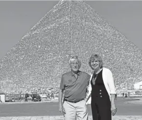  ?? COURTESY OF VALERIE GRACZYK ?? Wayne and Val Graczyk pose in front of a pyramid in Egypt during their Nile River Cruise trip, which ran from Feb. 20 to March 2, 2020.