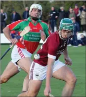  ??  ?? Kyle Firman of St. Martin’s is watched by Declan Ruth (Rapparees) in Saturday’s drawn JHC semi-final.