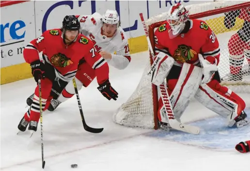  ?? MATT MARTON/AP ?? Goalie Kevin Lankinen and defenseman Nicolas Beaudin gained key experience with the IceHogs before jumping to the Blackhawks this season.