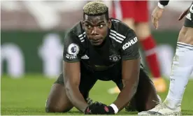  ??  ?? Manchester United’s Paul Pogba saw his late effort saved at Anfield. Photograph: Michael Regan/AP